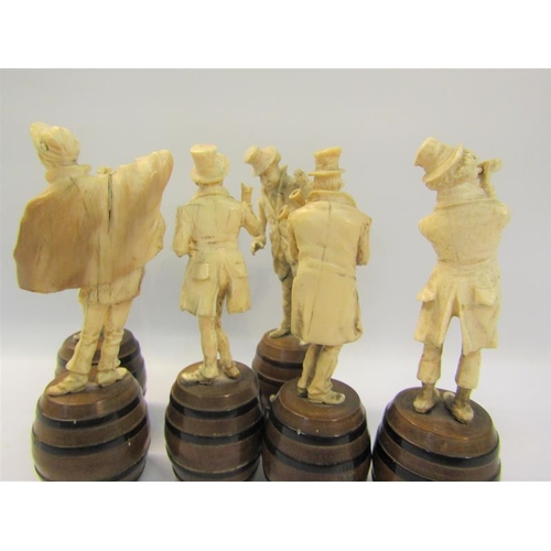 112 - A late 19c German group of six carved ivory street musicians standing on wooden barrels, each figure... 