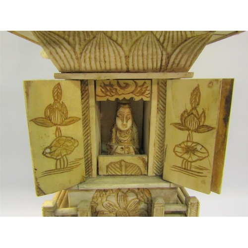 116 - A late 19c carved ivory Pagoda shrine, 25cms h.