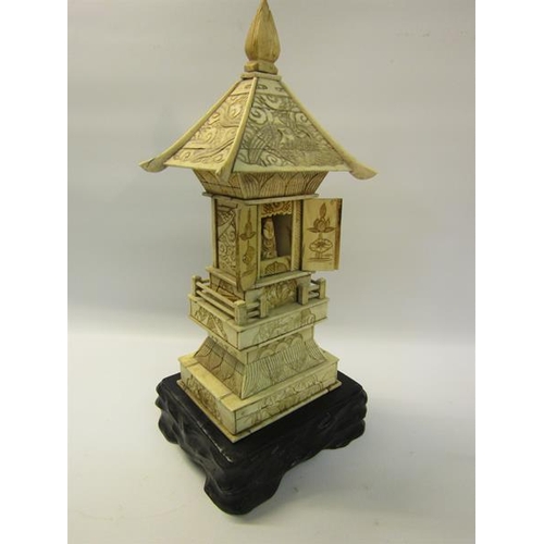 116 - A late 19c carved ivory Pagoda shrine, 25cms h.