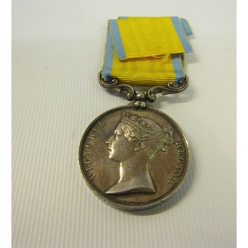 148 - A Victoria 1854-1855 Baltic medal with ribbon in box.