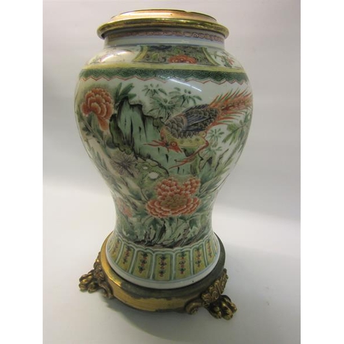 355 - A late 18/early 19c Oriental famille verte baluster vase decorated with exotic bird, flowers and ins... 