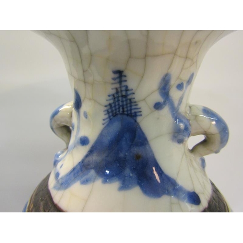 357 - A pair of early 19c Chinese baluster vase and covers, blue on white decorated ladies in veranda sett... 