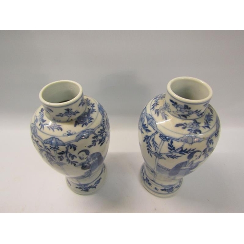 359 - A pair of 19c Oriental crackleware vases of baluster form, decorated blue on white with scholars and... 