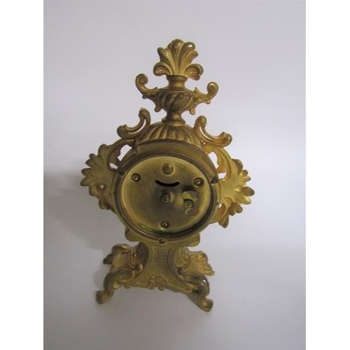 4 - A late 19c American mantel clock by the Amsonia Clock Co. in rococo cast gilt case embellished with ... 