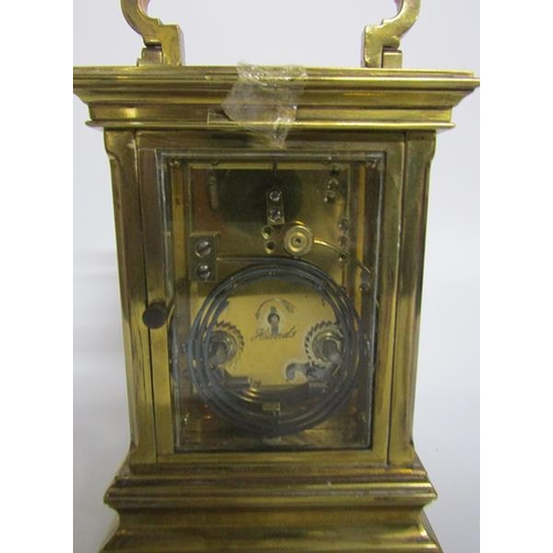 5 - A late 19c striking French carriage clock in glazed brass case with chamfered corner posts and mould... 