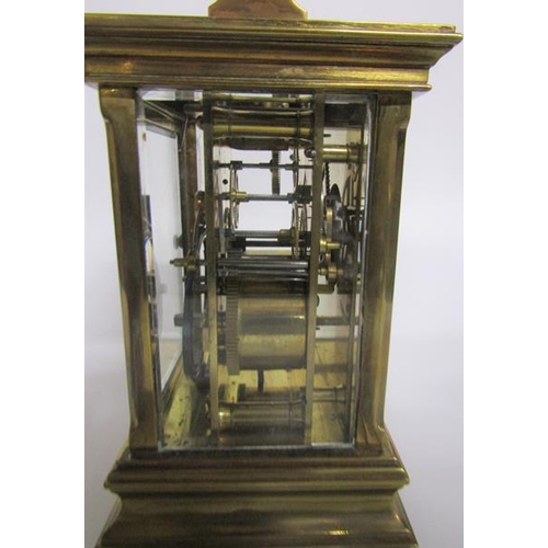 5 - A late 19c striking French carriage clock in glazed brass case with chamfered corner posts and mould... 