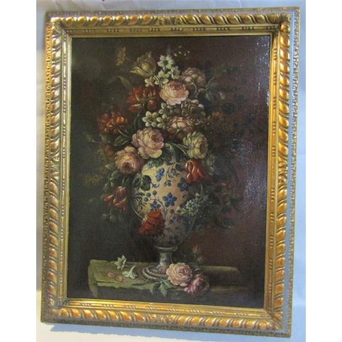 492 - Unsigned 19c Dutch School - a bouquet of flowers in a Delft baluster vase, oil on canvas. Framed, 79... 