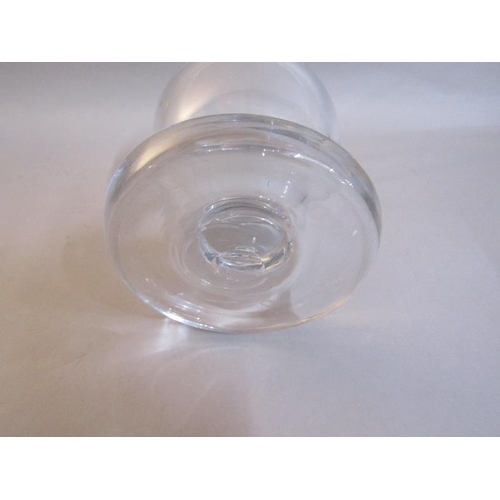 328 - A late 19c clear glass Tavern Salt on a short stem with a heavy circular base.  11cms h.