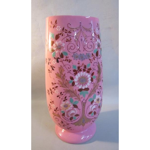 340 - A late 19c pink overlay glass vase, painted with sprays of flowers, 31cms h.