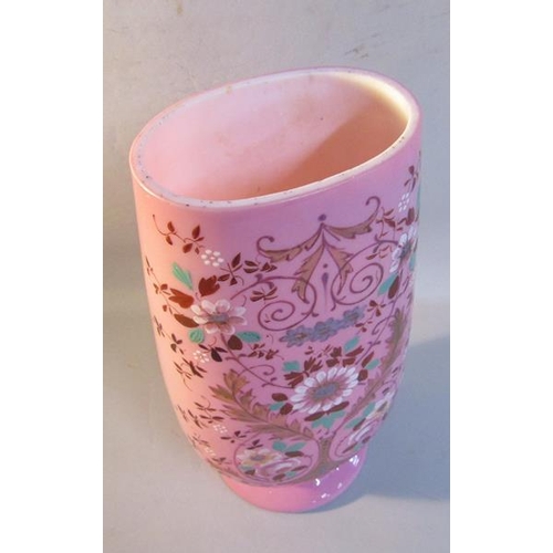 340 - A late 19c pink overlay glass vase, painted with sprays of flowers, 31cms h.