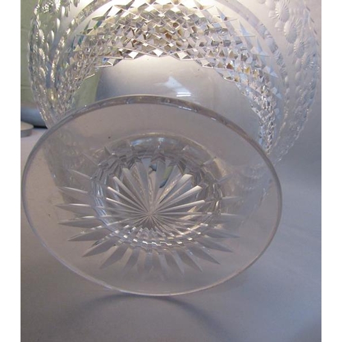 344 - A crystal centre bowl, diamond cut and wheel engraved around rim with garlands of flowers on a star ... 