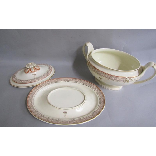 370 - A Wedgwood oval cream ware soup tureen, cover and stand of oval form.  The two handled tureen with f... 