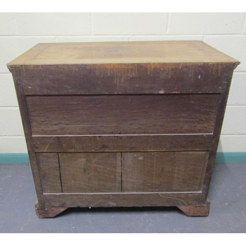 546 - An 18c figured walnut chest of two short and three long graduated drawers.  The top with wide cross ... 