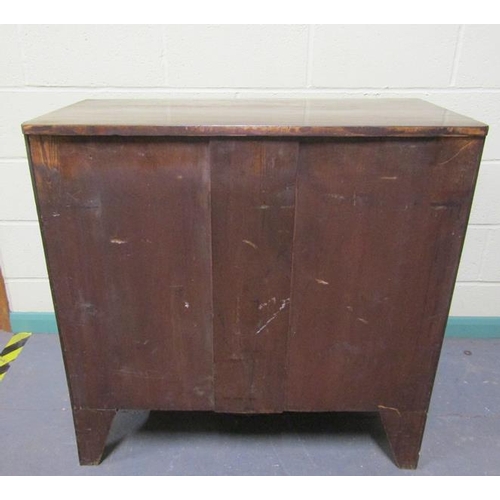 570 - A late Georgian mahogany bow front chest of three long graduated drawers with circular stamped brass... 