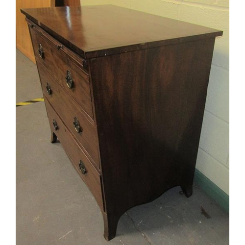 571 - A late Georgian mahogany chest of three long graduated drawers with a slide, supported on splayed le... 