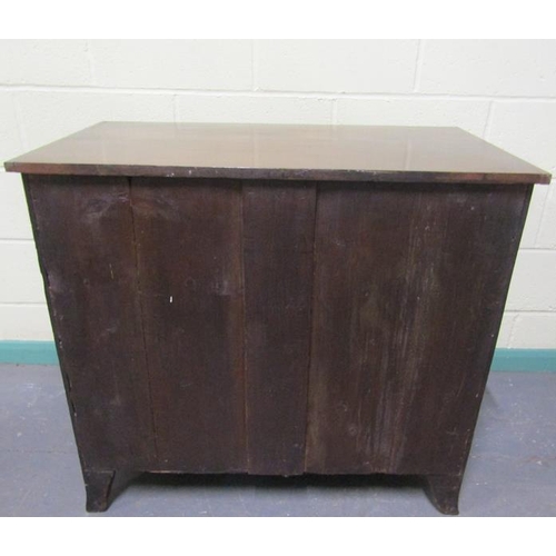 571 - A late Georgian mahogany chest of three long graduated drawers with a slide, supported on splayed le... 