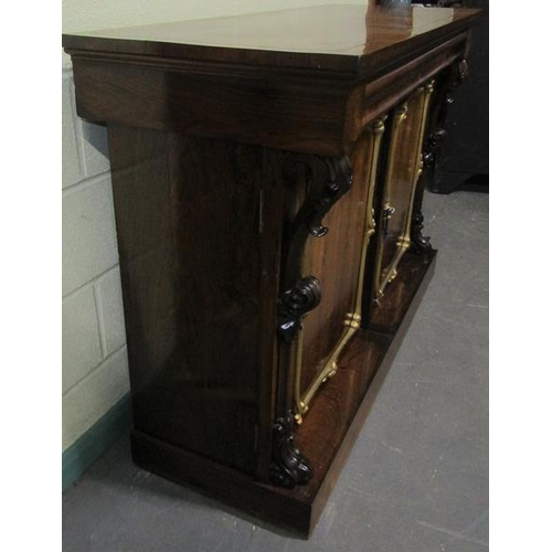 580 - A Victorian rosewood side cabinet of rectangular form, cross banded and with brass rail inlay.  Havi... 