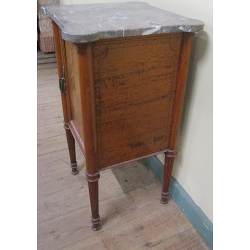 550 - A 19c Continental satinwood marble top pot cupboard on reeded tapering legs with pad feet.  40cms w ... 