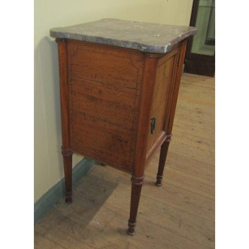 550 - A 19c Continental satinwood marble top pot cupboard on reeded tapering legs with pad feet.  40cms w ... 