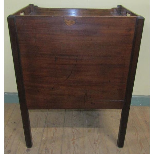 552 - A George III mahogany tray top bedroom commode with pull out drawer over pot cupboard and having one... 