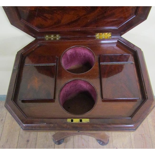 555 - Early 19c figured mahogany teapoy fitted with two tea boxes with rising covers together with two mix... 