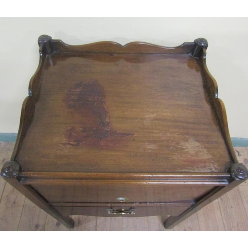 556 - A George III mahogany tray top bedroom commode with a cupboard enclosed by a hinged lift up door ove... 