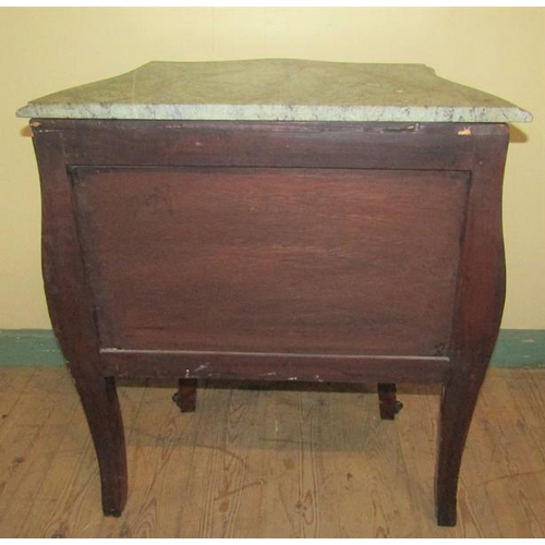 559 - A late 19/early 20c small marble top bombe chest of three drawers with brass fittings supported on s... 