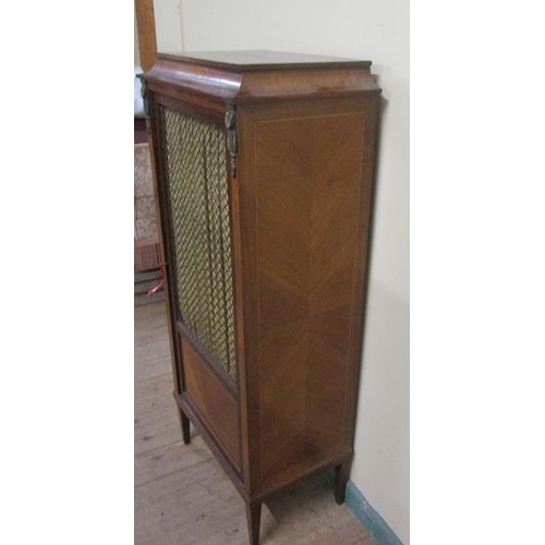 560 - Late 19/early 20c walnut veneered standing cabinet with satinwood line inlay, the shell cabinet encl... 