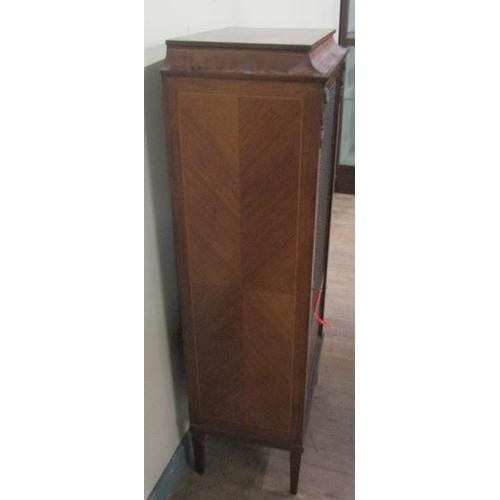 560 - Late 19/early 20c walnut veneered standing cabinet with satinwood line inlay, the shell cabinet encl... 