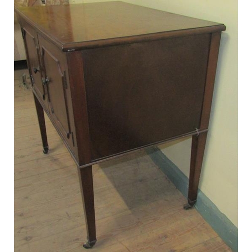 573 - A 19c mahogany bedroom cabinet of rectangular form with moulded top edge, fitted shelf and enclosed ... 