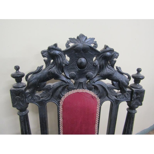 617 - A late Victorian set of eight (6 +2) oak dining chairs, ebonised, all with lion and shield pediments... 