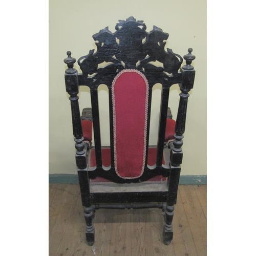 617 - A late Victorian set of eight (6 +2) oak dining chairs, ebonised, all with lion and shield pediments... 