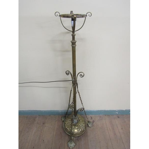 34 - A late Victorian brass oil lamp stand with electrical fittings. Adjustable column having oil lamp ba... 