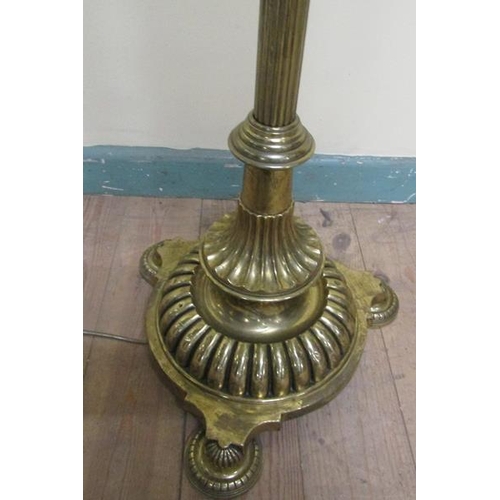 35 - A late Victorian brass oil lamp stand with electrical fittings with adjustable reeded column on a ci... 