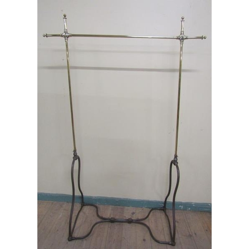 36 - A 19c brass and steel clothes rail of adjustable height.  132cms w x 193h.