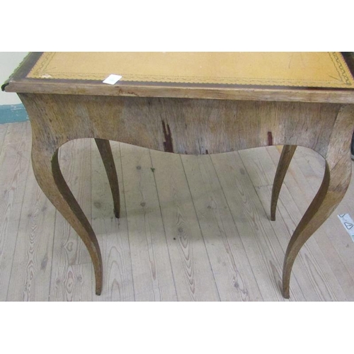 542 - A 19c French rosewood writing table or rectangular form, the top with tooled leather insert within a... 