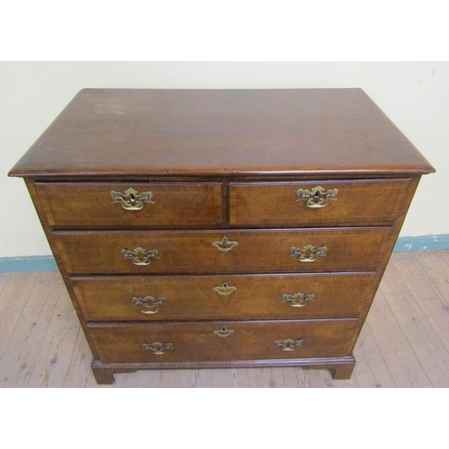 568 - Late Georgian figured walnut veneered chest of two short and three long drawers, all with brass fitt... 