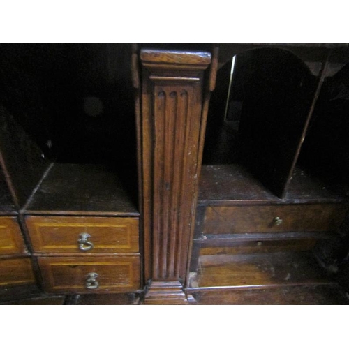 569 - A mid Georgian figured walnut veneered cross banded bureau with fall front and fitted interior over ... 