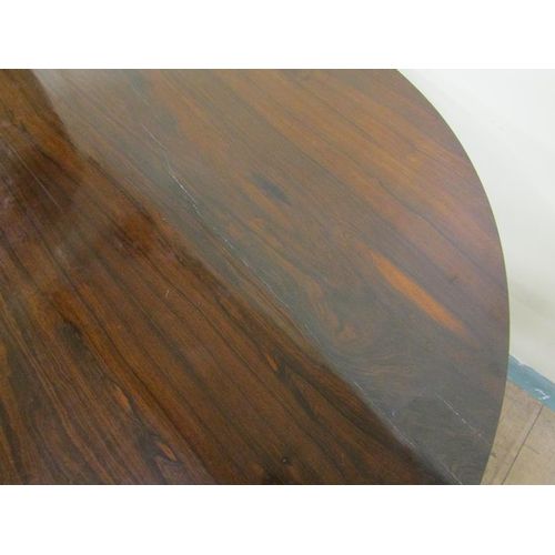 584 - A William IV rosewood circular tilt top breakfast table on a facet column with tripartite base and c... 