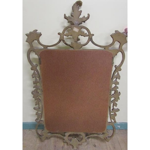 591 - A mid Georgian style gilt wooden stucco wall mirror with scrolling leaf pediment sides and base.  73... 