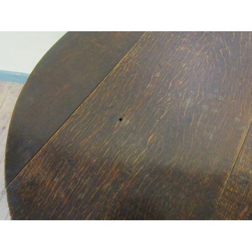 605 - A George III oak circular pedestal tripod table 73cms dia x 64cms h.