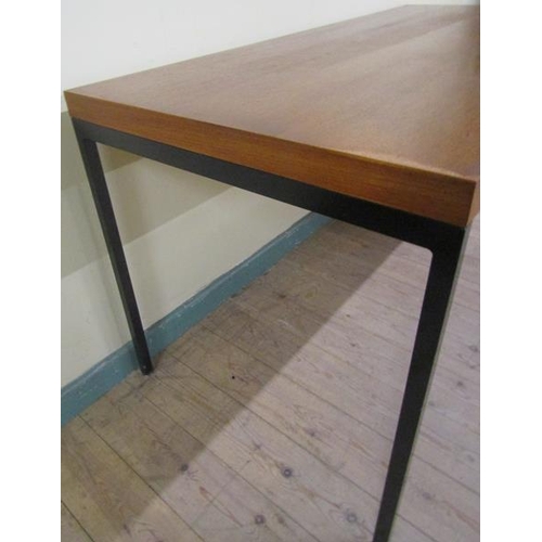 626 - An Ideal Heim teak and composite board rectangular work table on black painted metal frame with stra... 