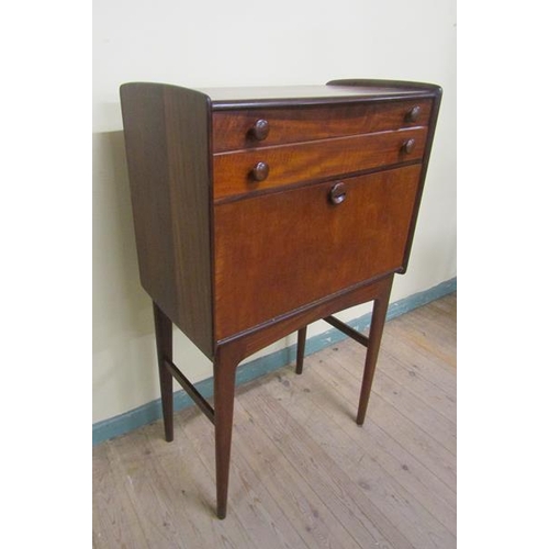 628 - A Younger Limited teak secretaire fitted two long drawers over fall front fitted secretaire and supp... 