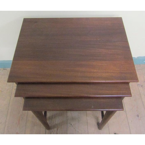 636 - A nest of three Litton Furniture teak occasional tables of square form, the largest 49cms w x 48cms ... 