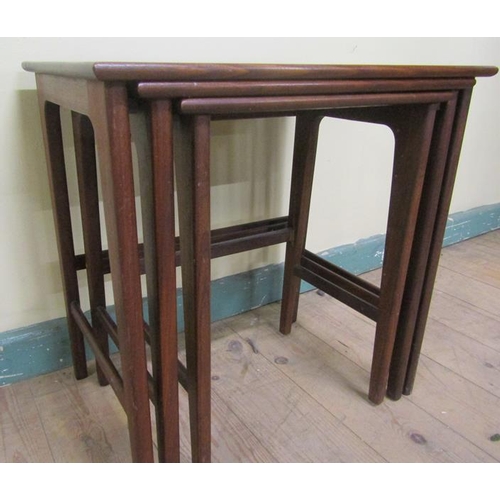 636 - A nest of three Litton Furniture teak occasional tables of square form, the largest 49cms w x 48cms ... 