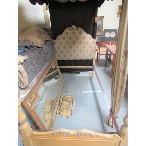 554 - A 19c painted four poster bedstead, the upholstered headboard with carved giltwood pediment, the pol... 