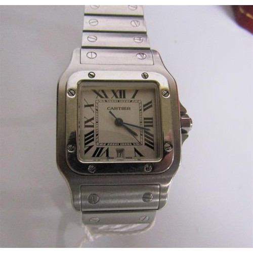 136 - A Cartier Santos midi steel gents wristwatch, serial no. 963566CD sold in 2014 and having a rectangu... 