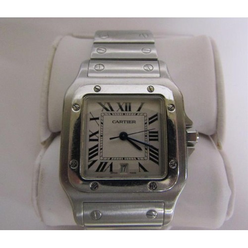 136 - A Cartier Santos midi steel gents wristwatch, serial no. 963566CD sold in 2014 and having a rectangu... 