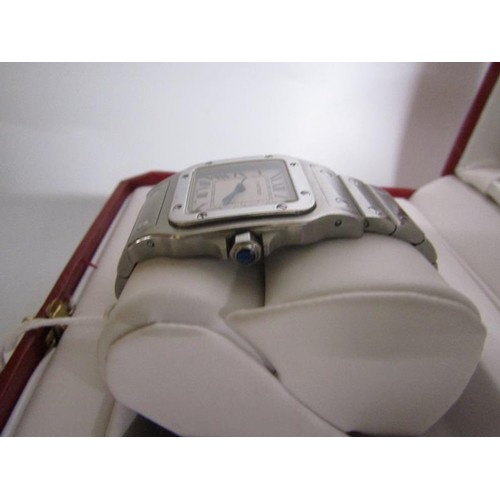 136 - A Cartier Santos midi steel gents wristwatch, serial no. 963566CD sold in 2014 and having a rectangu... 