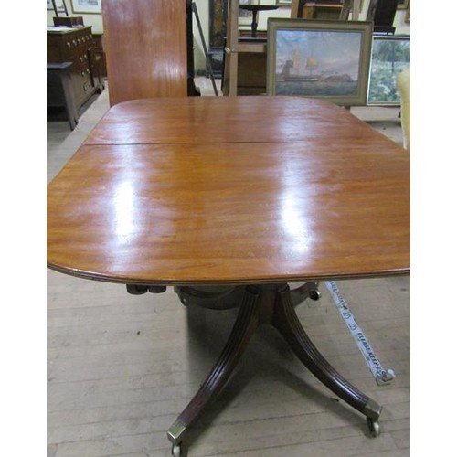 588 - A late Georgian style D end dining table with reeded edge, on two columns each with four splayed ree... 